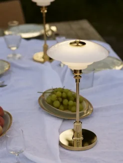 Louis Poulsen PH 2/1 portable table lamp, brass metallised