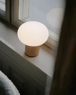 New Works Karl-Johan portable table lamp, ochre yellow