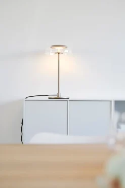 Nuura Blossi table lamp, Nordic gold - clear