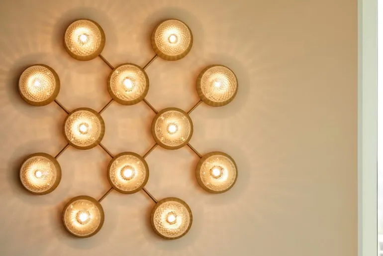 Nuura Liila 12 wall/ceiling lamp, gold - optic clear