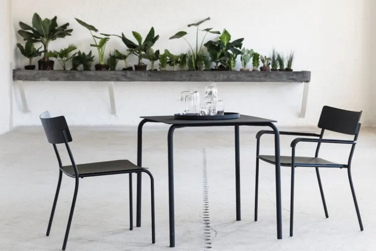 Serax August chair with armrests, narrow, green