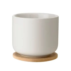 Stelton Theo tea cup with coaster, sand