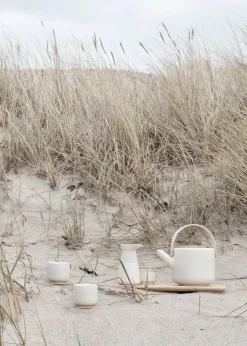 Stelton Theo tea cup with coaster, sand