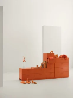 String Furniture Relief chest of drawers with legs, low, orange