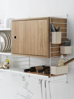 String Furniture String cabinet with swing door, 58 x 30 cm, oak