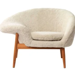 Warm Nordic Fried Egg lounge chair, Moonlight sheepskin