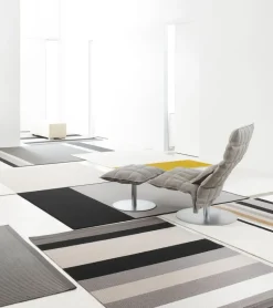 Woodnotes K chair, narrow, swivel plate base, stone/black