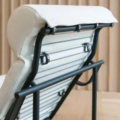 Yrjö Kukkapuro Remmi lounge chair, black - white leather