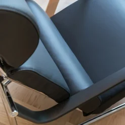 Yrjö Kukkapuro Remmi lounge chair, chrome - black leather