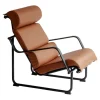 Yrjö Kukkapuro Remmi lounge chair, black - cognac leather