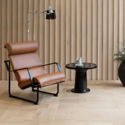 Yrjö Kukkapuro Remmi lounge chair, black - cognac leather